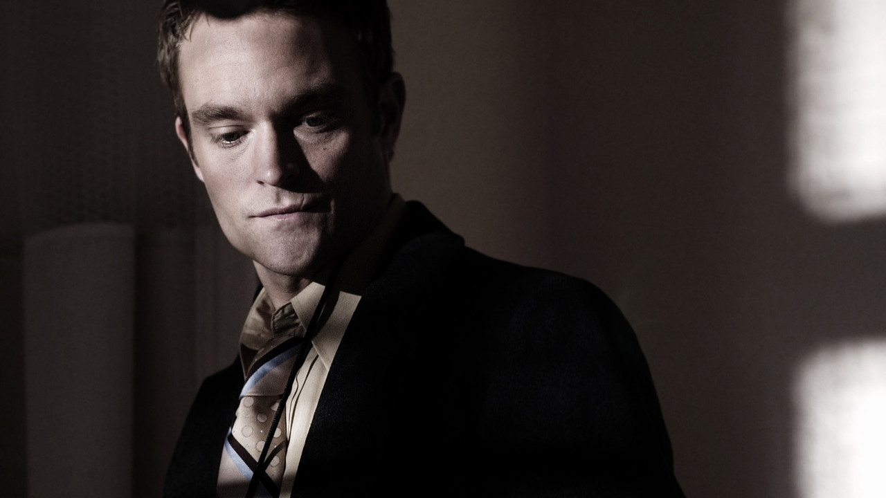 The Donald Strachey Collection background